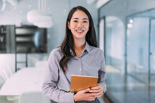 istock Confident businesswoman in modern office. 2234217611