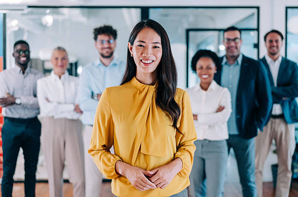istock Confident businesswoman and her team. 2234217641
