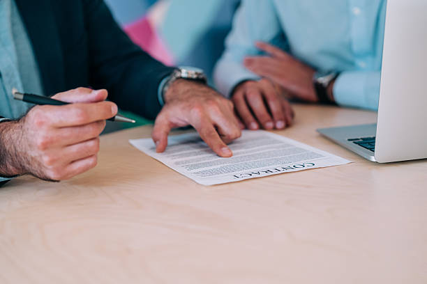 istock Business people signing a contract in the office. 2234217665