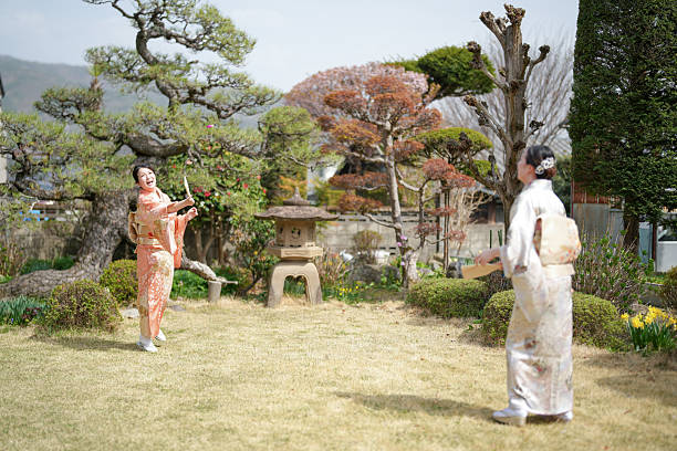 Hanfu beauties picking tea at sunset