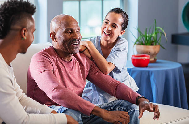istock Multigeneration family, sitting on sofa, conversing 2234218982