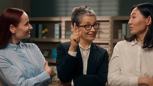 istock Thoughtful multiethnic team employees coworkers three colleagues thinking pondering contemplate idea women females businesswomen business office solution decision create planning pensive girls company 2234223249