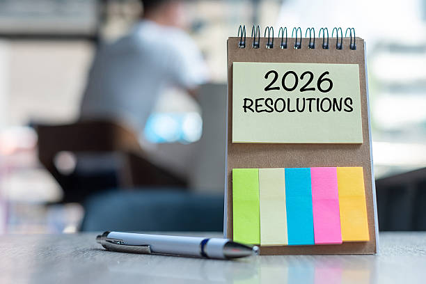 istock 2026 Resolution word on note paper with pen on wooden table. strategy, solution, goal, business, New Year New You and happy holiday concepts 2234230135