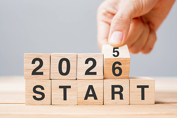 istock hand flipping block 2025 to 2026 START text on table. Resolution, strategy, goal, motivation, reboot, business and New Year holiday concepts 2234230294