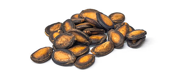 istock Dried watermelon seeds for snack on white background 2234235026