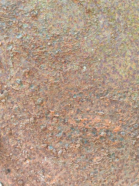 istock Old yellow grunge metal wall with red rust, background texture 2234236103