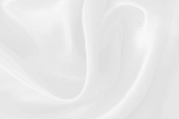 istock White fabric texture background, detail of silk or linen pattern. 2234238522
