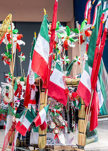 istock A bunch of Mexican flags are displayed on a table, Mexican independence day ornaments 2234239338