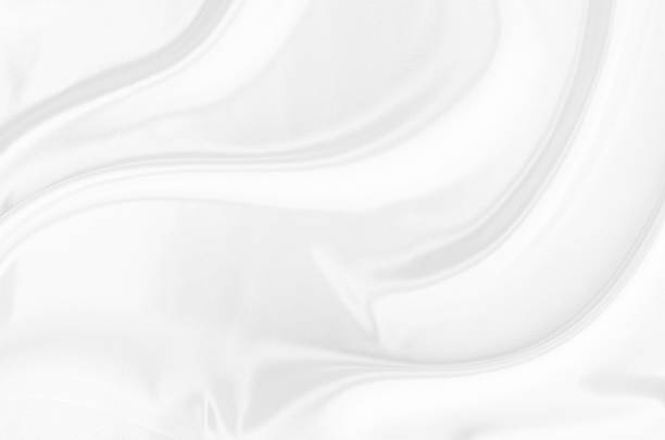istock White gray satin texture that is white silver fabric silk background with beautiful soft blur pattern natural. 2234242490