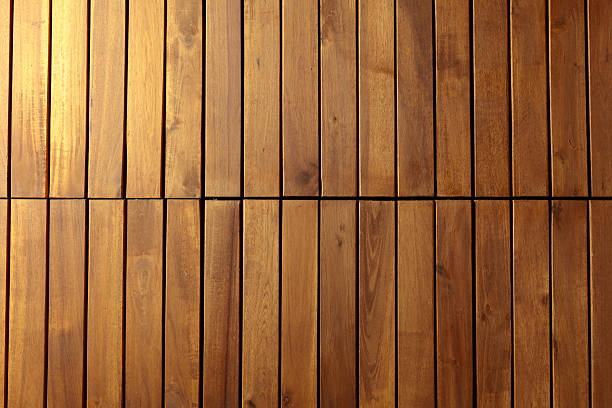 istock Decorative surface made of brown wooden slats. 2234242903