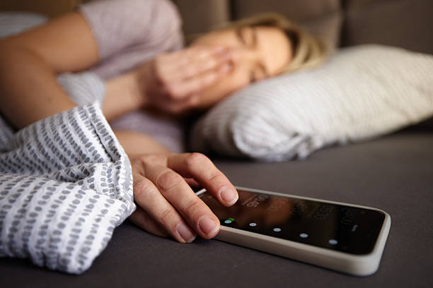 istock Turning off alarm on cell phone! 2234246776