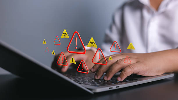 istock Cybersecurity Threat Warning with Laptop and Online Risk Alert Icons 2234247109