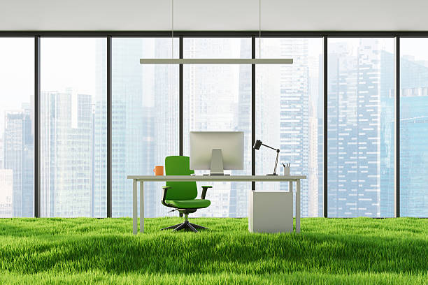 istock Modern eco-friendly office interior with green grass floor and city view through large windows representing sustainability concept. 3D Rendering 2234254344