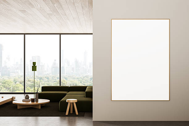 istock Modern bright interior with large blank poster on beige wall next to panoramic window and green sofa in minimalist living room mockup template design. 3D Rendering 2234254473