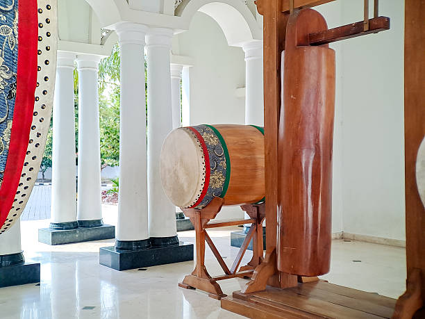 istock Traditional drum and hanging wooden percussion instrument stand inside white column architecture. 2234257581