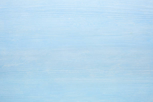 istock Light blue painted natural wooden background. Top view 2234258923
