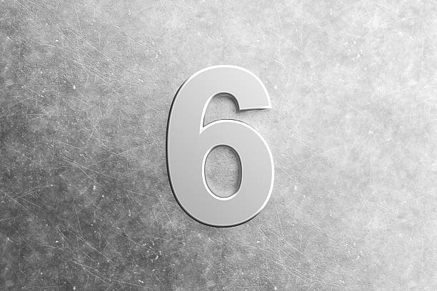 istock Number six embossed on a scratched metal background 2234261488