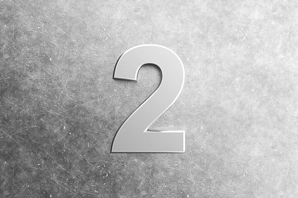 istock Number Two embossed on a scratched metal surface 2234261565