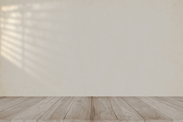istock In room the key elements: it's empty, has wood floor and wall, a vintage or aged design, as suggested by the tags like vintage, grunge, old, sun light effect and texture. 2234261750