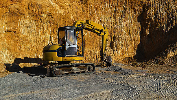 istock Yellow excavator working at quarry site 2234264073