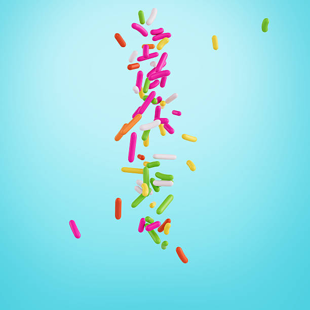 istock Colorful Sprinkles For Cakes And Bakery Items Falling From Top On cyan Background 3D Illustration 2234265246