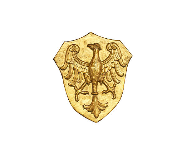 antique gilded eagle emblem isolated on white background