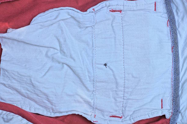 istock red white fabric texture of crumpled fabric on clothes 2234270130