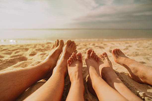 istock families feet on the beach 2234271623