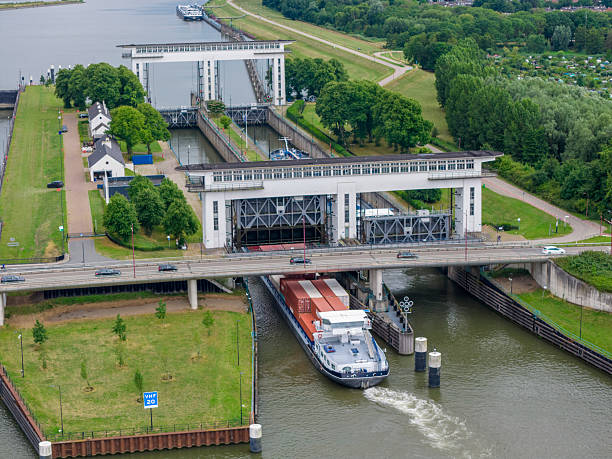 istock Freight ships at the Prinses Beatrixsluis seen from above 2234274928