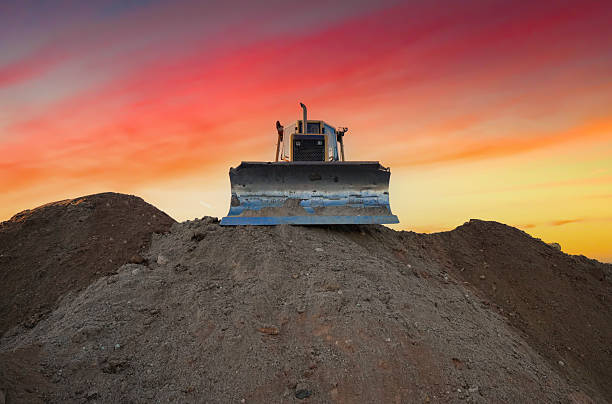 istock Dozer at construction site on sunset. Earth-moving machinery. 2234283482