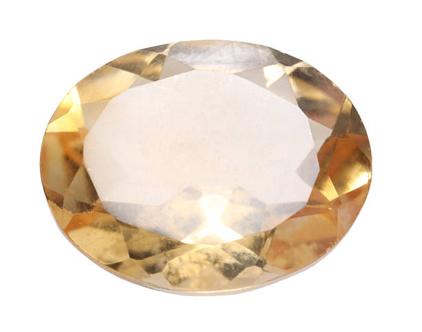 istock One yellow shiny gemstone isolated on white 2234285036