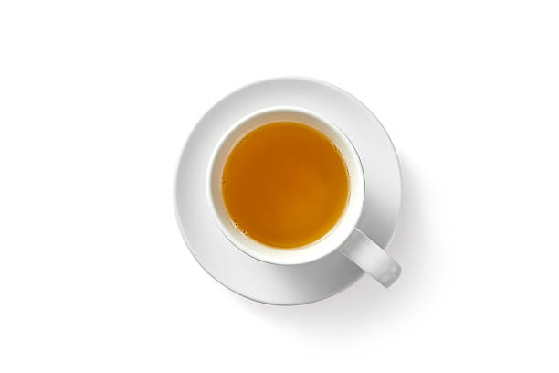 istock Black tasty aromatic tea in cup isolated on empty white background 2234287127