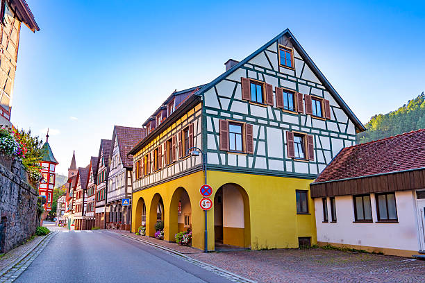 Traditional colorful half timbered facades on historic street in Schiltach village Black Forest Germany