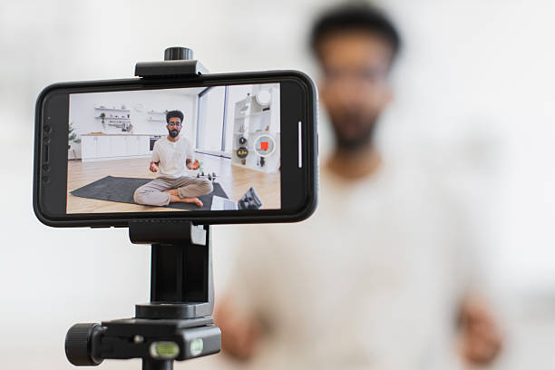 istock Man filming meditation video tutorial promoting mindfulness and health 2234294258