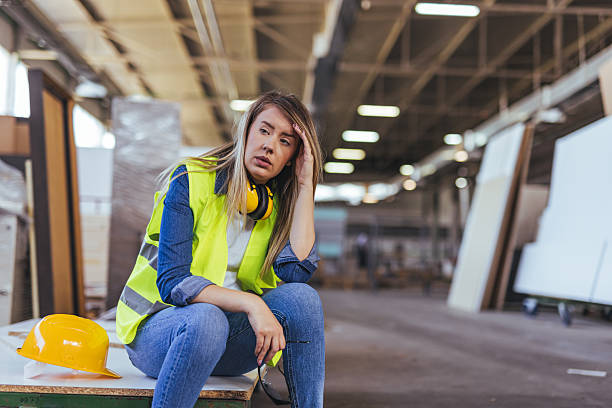istock Tired Female Construction Worker Taking a Break at a Job Site 2234298216