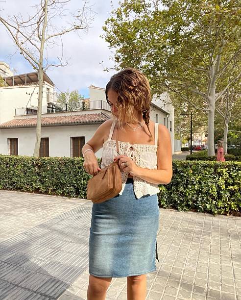 istock Woman Looking for things in her handbag 2234298454