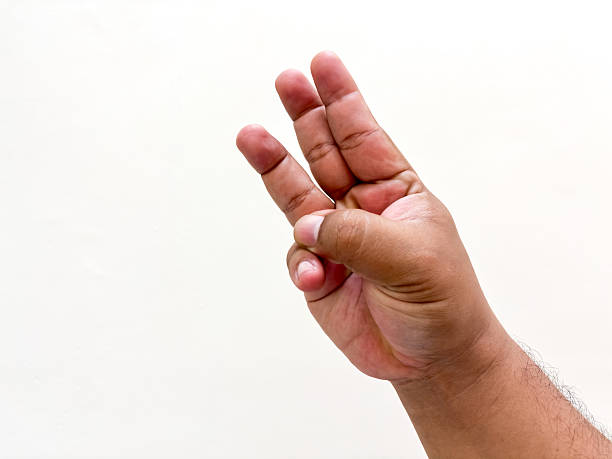 istock Hand gesture representing the number three against a blank backdrop depicting numerical counting in a simple studio shot emphasizing clarity and utility illustrating visual language on white canvas 2234303545