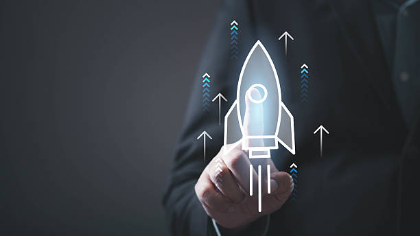 istock A hand activates a digital rocket icon, symbolizing innovation, growth, and technological advancement. 2234304264