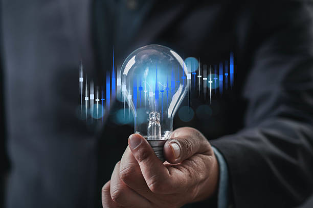 istock A hand holding a light bulb with sound wave graphics, symbolizing innovation, ideas, and technology in a modern context. 2234304960