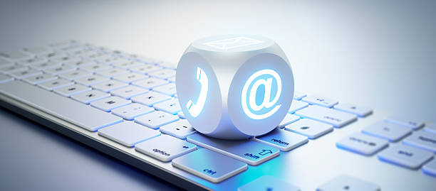 istock Dice with communication symbols on keyboard 2234313093