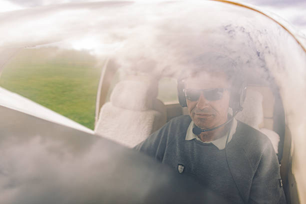 istock Pilot sitting in a cockpit, flying a plane 2234316326