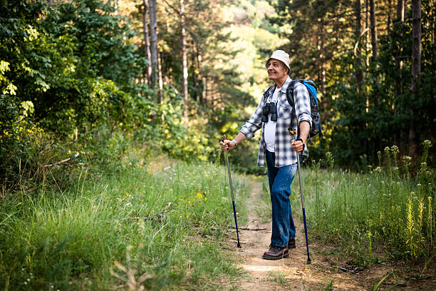 istock Happy senior man on hiking trip 2234319413