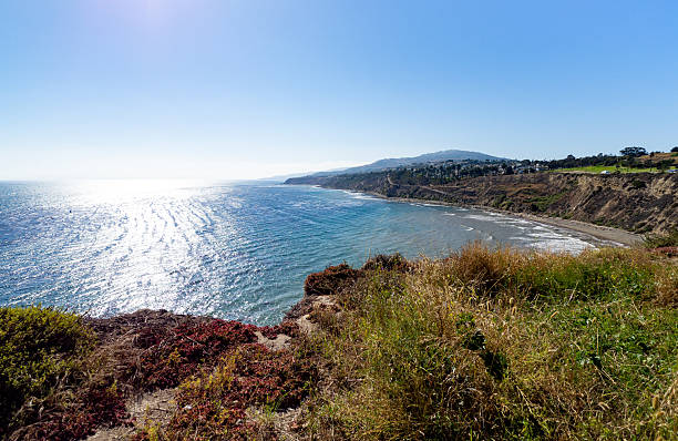 istock Beautiful Coastal Landscape Featuring Cliffs, Ocean Waves, and Clear Blue Sky 2234321040