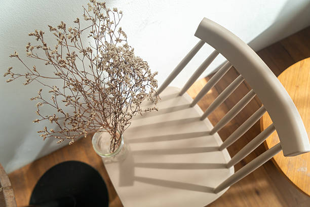 istock Minimalist Chair with Dried Flowers Display 2234321574