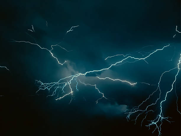 istock thunder lightning bolts illuminate the clouds in the background striking and intense atmosphere lighting spectacle blinds the brilliance of nature's elements 2234323231
