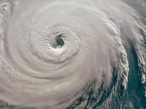 istock tornado as a powerful natural force, creating foam in the sea 2234323292