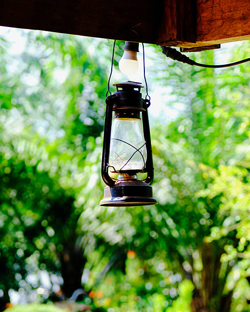Antique blue oil lamp hanging on the wall