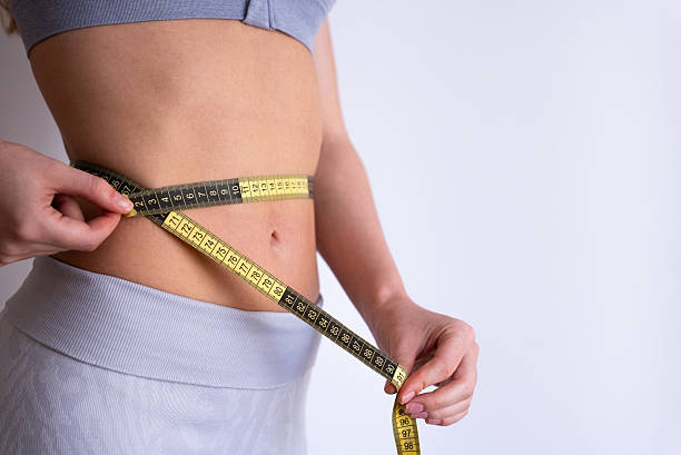 istock Side profile waist measurement close-up 2234332607