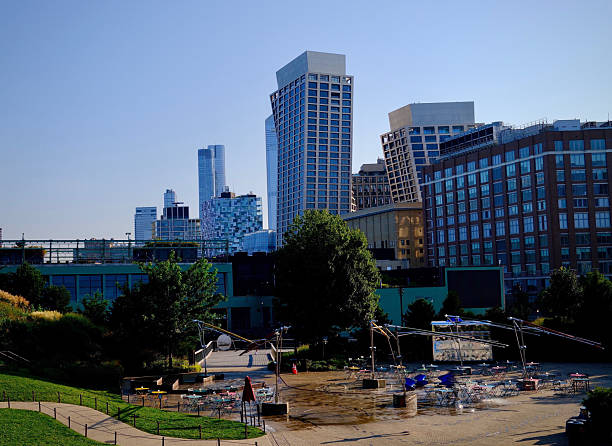 istock Downtown Manhattan Park Surrounded by Quirky Buildings (New York, New York, USA) 2234333367