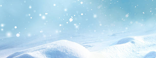 istock Original wide format image with snowdrifts and falling snow. 2234336104
